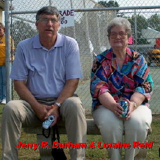 Jerry R. Durham sitting next to Loraine Reid.